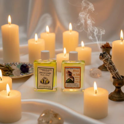 Two small bottles of Arasa intention oils sold at Botanica Aragba Yomilo